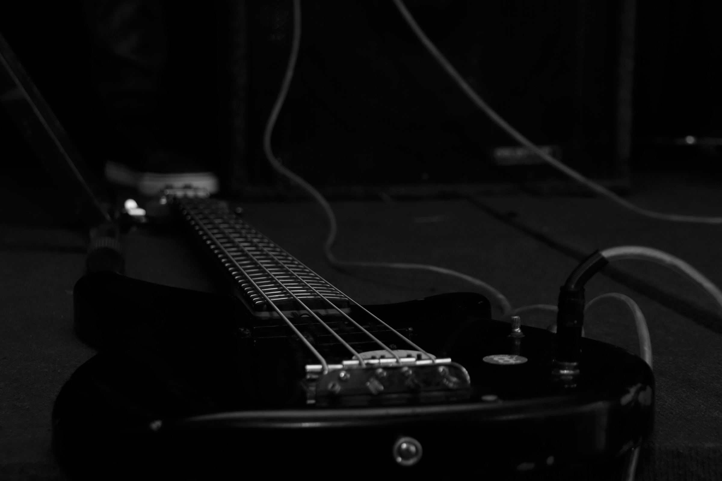 A Grayscale of a Bass Guitar